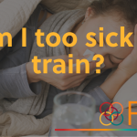 "A woman is lying in bed, wrapped in a blanket, holding a tissue to her nose while appearing sick. A glass of water and medicine are on the bedside table. Overlaid text in bold orange letters reads, 'Am I too sick to train?' In the bottom right corner, there is a colorful circular logo followed by the letters 'FAQ' in orange.