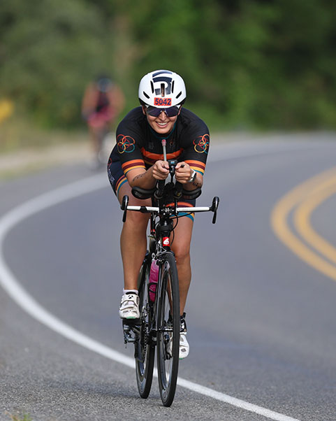 Coach Kari biking at Michigan Titanium
